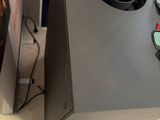 two speakers that are sitting on top of a table