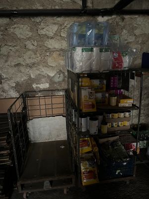 a cart with a lot of food on it in a room
