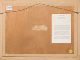 an old picture of a piece of wood with a piece of paper attached to it