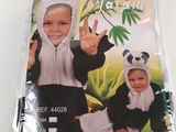 a picture of a child wearing a panda bear costume