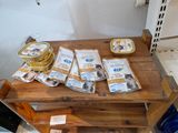 a wooden table with a lot of food on top of it