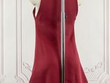 the back of a red dress on a mannequin mannequin stand