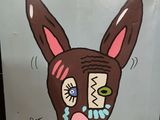 a sign that has a picture of a donkey on it