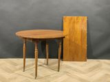 an image of a table with a wooden top on a wooden floor