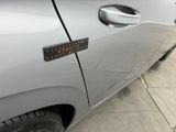 a sticker on the door of a car that says hello
