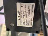 a close up of a piece of metal with a label on it