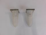 pair of white marble wall sconces on a white background