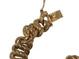 gold chain bracelet and bracelet with a gold clasp on a white background