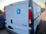 a white van that is parked in a parking lot