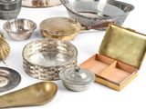 a lot of silver items that are on the table