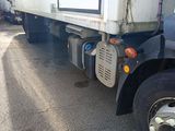 a truck that is parked on the side of the road