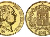 une pièce souveraine en or surmontée d'une couronne