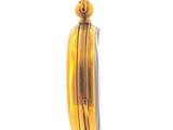 a small gold object hanging from a chain