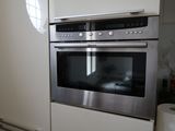 an image of a stainless steel oven in a kitchen