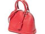 a red handbag on a white background