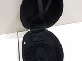 a black case that has a red handle on it