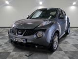 a picture of a nissan juke suv parked in a garage