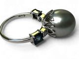 une image d'une bague en perles et diamants sur fond blanc