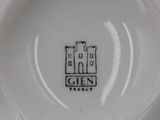 a close up of a plate with a castle on it