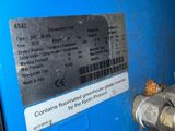 an image of a blue machine with a label on it