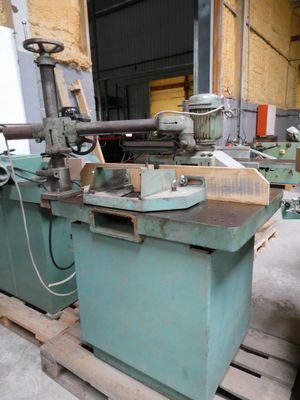 a machine that is sitting on a pallet in a warehouse