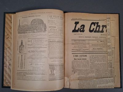 un vieux journal sur lequel figure la photo d'un train