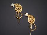 a pair of gold and pearl earrings