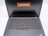 the lenovo laptop is open and ready to be used