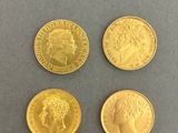 three gold sovereigns, one of which is a sovereign and one of which is a sovereign