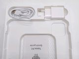 a white box with a charger and a charger on it