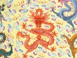 an image of a yellow plate with a dragon design on it