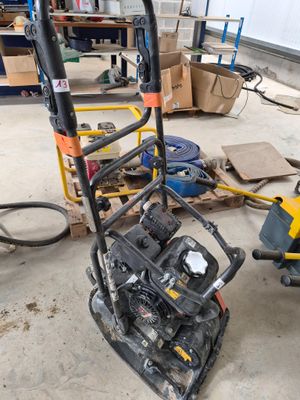 an image of a small hand truck in a garage