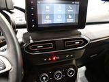 a car dashboard with a tablet on the dashboard