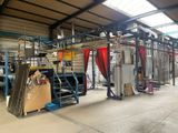a large room with a lot of machines in it