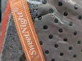 a close up of a hat with a label on it