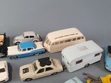 a lot of toy cars that are sitting on a table