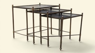 the three tables are made of metal and glass