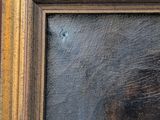 an oil painting of a dog ' s head in a gold frame