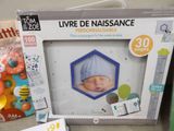 a picture of a baby in a picture frame in a store