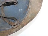 a close up view of a helmet with a strap on it