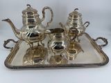 silver plated tea and coffee set on tray on white background