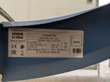 a ticket on the back of a blue chair