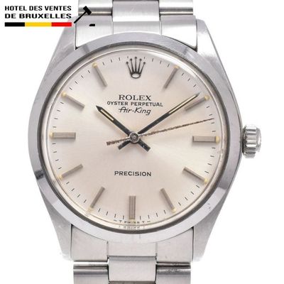 an image of a rolex watch with a white dial on a bracelet