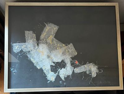 a picture of a black and white painting on a table