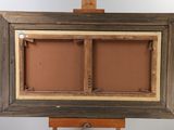 a picture of an easel with a picture on it