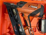 an orange box with a stapler and a stapler in it
