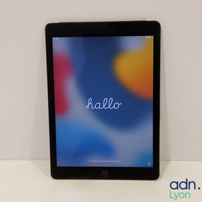 an image of a tablet computer sitting on top of a white table
