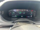 the dashboard of a car with a digital display in the center