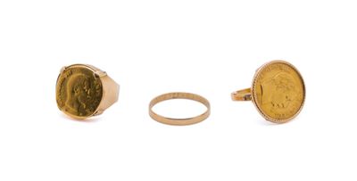 an image of a gold coin and a ring on a white background