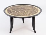 a black table with a brown and white design on it